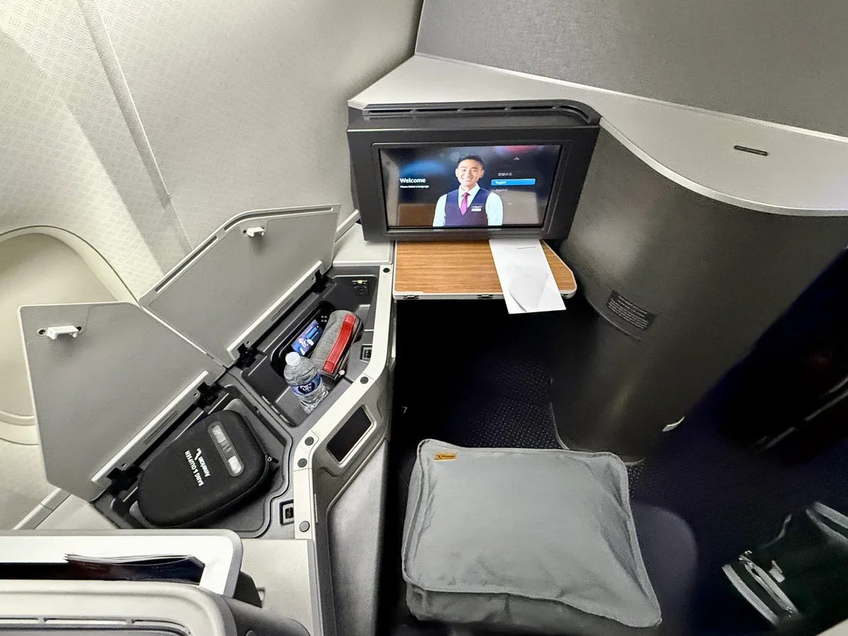 Modern business class cabin view on transatlantic flight from USA to Europe